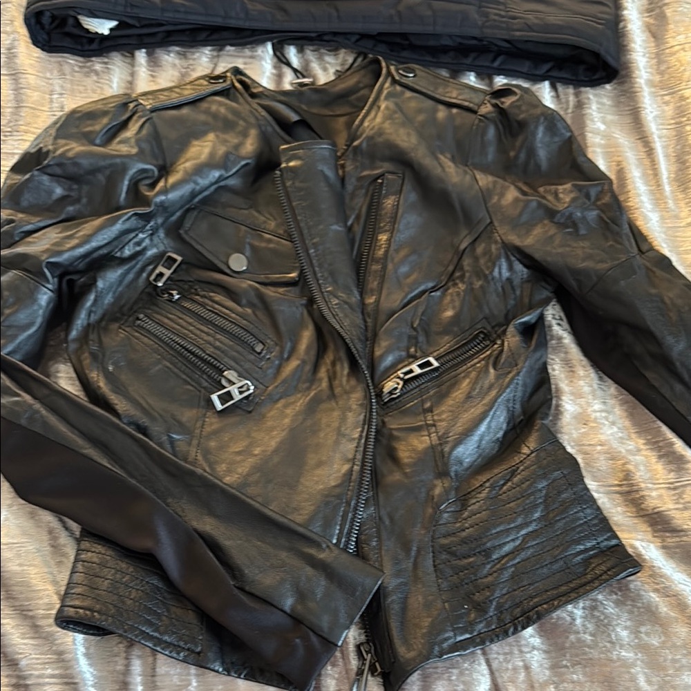 Black Leather Jacket with Zipper Details